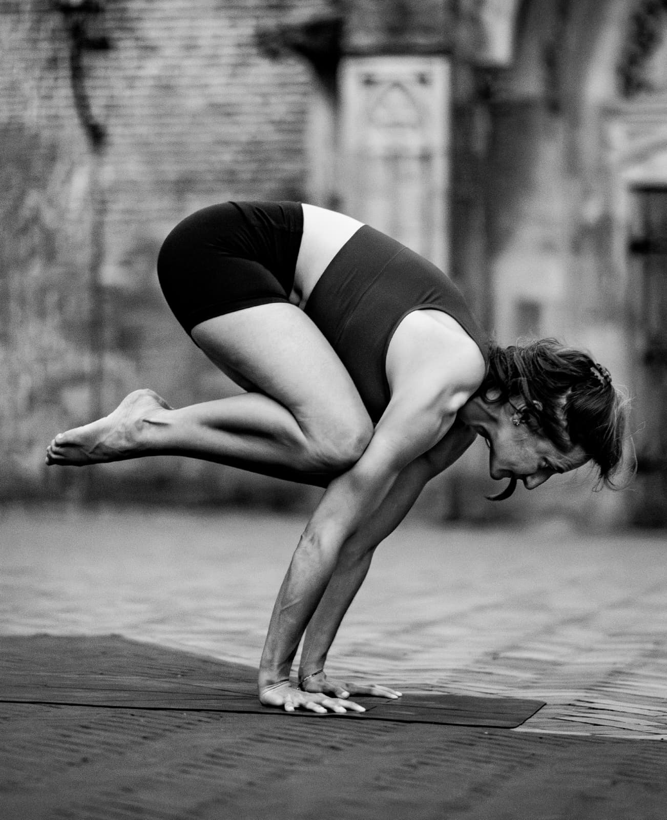 Crow pose arm balance at a yoga retreat in the Belgian Ardennes